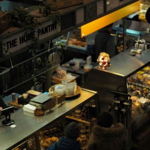A full store with the lights dim.